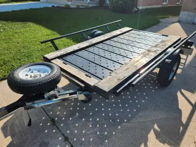 I'm selling an double ATV utility trailer that is used but in good working condition, perfect for ha...