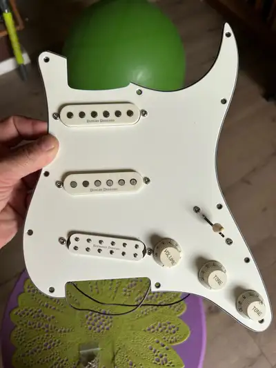 Loaded Strat Pickguard for sale. This is from a Squier deluxe strat and originally came with three s...