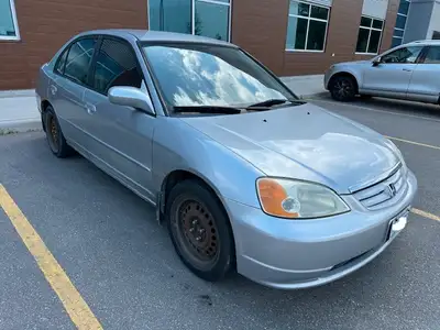 2003 honda civic , its old but reliable and well maint., original owner , no accident, minor rust, b...
