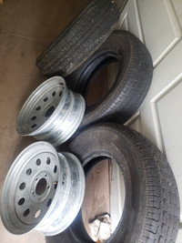 10 ply  ST225 75R 15"  tires. 15" Galvinized Rims $250.00 OBO