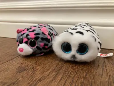 Stackable TY Beanie Boos. My daughter cut the tag off of the grey and pink one, but otherwise they a...