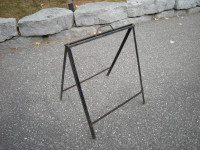 2 FOLDING METAL SIGN HOLDERS or saw horses
