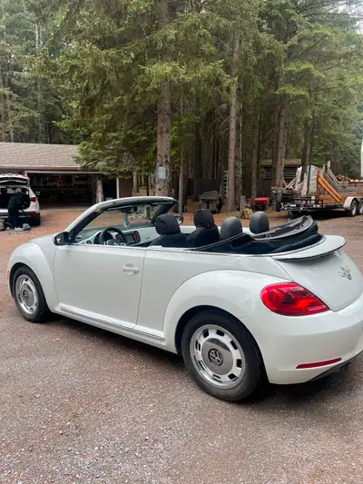 Not another one like it in Western Canada. A rare find, 2015 Beetle Convertible with Pearl White int...
