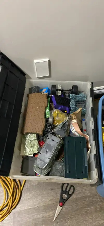 Bin of assorted Lego pieces