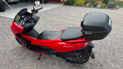 The perfect commuter, grocery getter, and fun machine for zipping around town. At 300cc she's got lo...