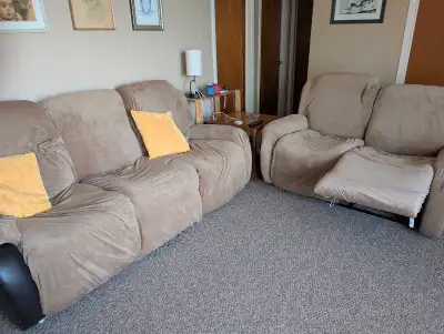 Free reclining sofa and love seat, View more
