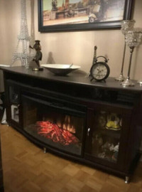 New Fireplace TV Stand that lights up and can heat the room too