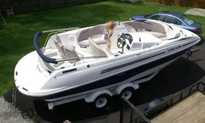 Fun boat for family, open concept, newer bimini top, newer marine upholstery, trailer, 240 HP EFI me...