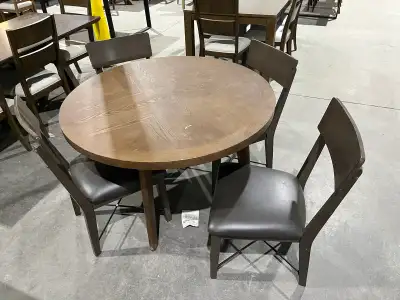 48” round dining table has a few marks, comes with 4 chairs, $345 Hi our warehouse is at 133 Paramou...
