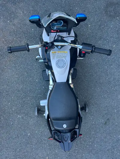 BMW Kids 6V Ride-On Police Motorcycle – $60 (needs new battery), View more