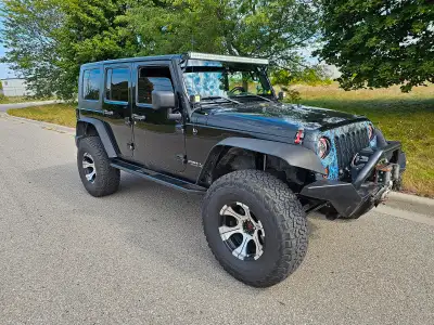 2008 Jeep Wrangler JK Sahara 4 Door. This is a tough Jeep. Will go anywhere. 4 inch lift, brand new...