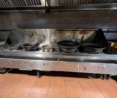 Good working condition.1 7 ft 3 burner wok. 2 10 feet steam table with glass top, 2 Mitsubishi Ac un...
