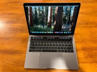 Selling my 2019 MacBook Pro 13-inch with Touch Bar, in great condition and fully functional. Specs &...