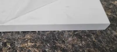 Quartz splash guard for vanity counter bathroom. New, still in plastic packaging 4 inches wide - 21....