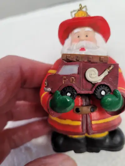 Santa Fireman Delivering Truck For Christmas Ornament, View more