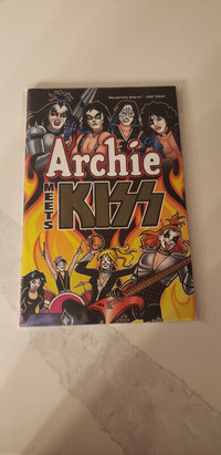 ARCHIE MEETS KISS TRADE PAPER BACK COMIC. r