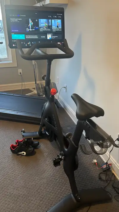 Get ready to elevate your fitness game with this Peloton Bike! This used exercise bike is in great c...