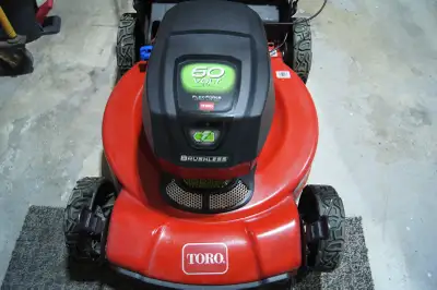 I am selling my Toro 21466 Personal pace Rear wheel drive lawnmower, includes the 60V Lithium Batter...