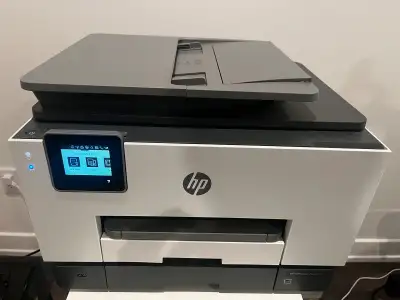 I'm selling an HP OfficeJet Pro 9015e all-in-one printer with a document feeder, perfect for home or...
