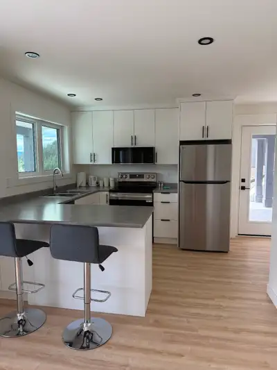 Bachelor suite available July 1st or sooner, private entrance with own laundry, full size fridge, st...