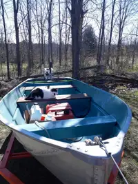 Aluminium fishing boat with motor and trailer