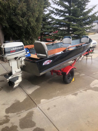 14 ft Lund aluminum boat , $5500 or obo