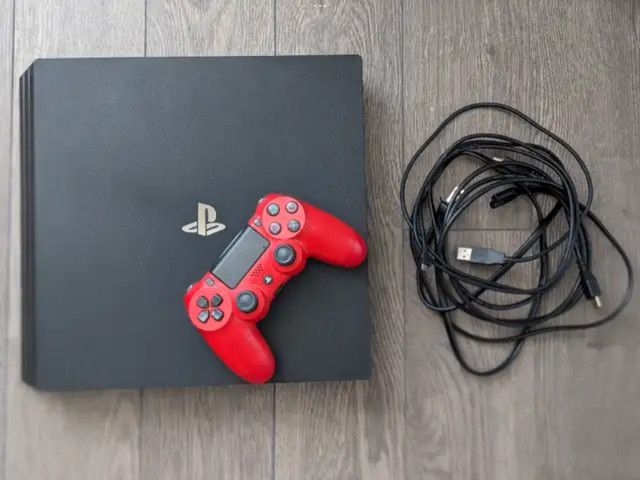 PS4 pro 1000 gb one controller all wires and 6 games in Sony Playstation 4 in Hamilton