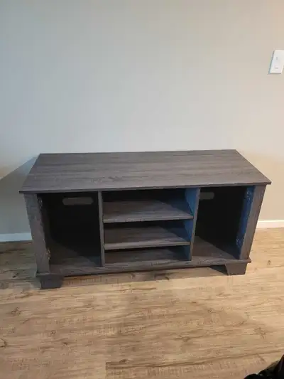 In great condition with adjustable shelves!