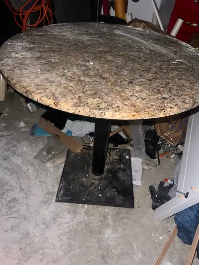 Round Table Stone Top with Metal Base $40, View more