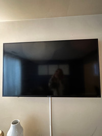 50” HD Sharp Roku TV with wall mount and Firestick