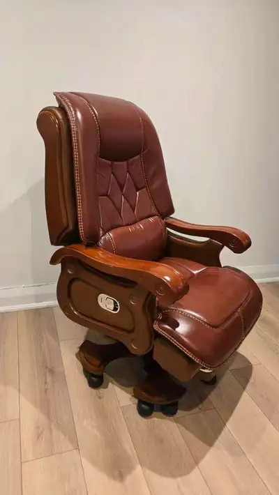 Brand new genuine leather executive chair with solid wood frame., View more