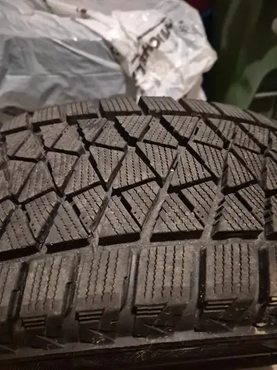 Winter tires and rims. Set of 4. Used only half a season. Great tread on all. Bridgestone blizzak. 2...