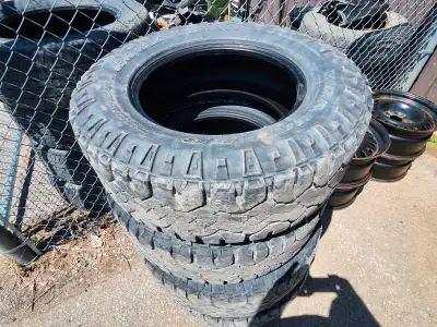 4 tires with just enough tread for a season , one tire cupped. $100 firm for all 4