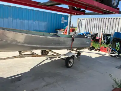 Boat trailer has new wheels and bearings. Did not buy cheap Chinese bearings. Boat comes with oars a...