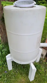 Rain Water Barrel.  2 taps, 2 strainers. Lift 2 feet high if + $