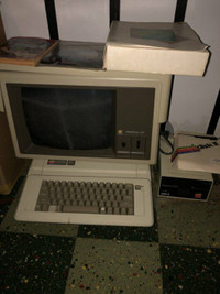 Apple IIe + Monitor III + Disk II + Books - $500