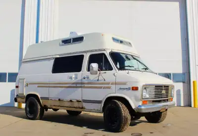 I'm selling a 1976 Chevy Van G20 Camper, a classic camper van ready for your next adventure. This vi...