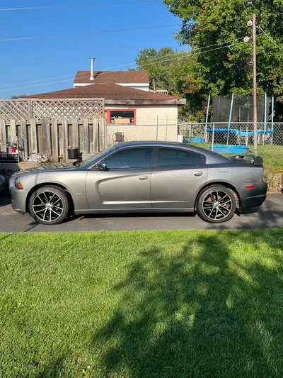 2011 Dodge Charger SXT , 39,500 kms , Dodge Daytona rims and tires , never winter driven , car is in...