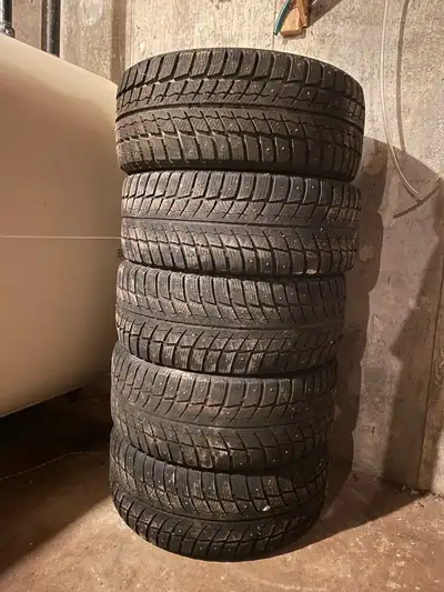 I'm selling a set of used 245/45R18 studded winter tires. These tires are already mounted on Dodge r...