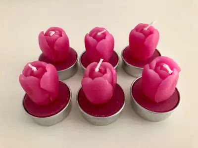 Black, 17.5" long tea light holder 12.00 Glass, 5" tall candle holder with rose candle 12.00 Set of...