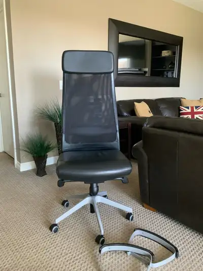 IKEA Markus chair- in black faux leather! ( not available anymore) Excellent chair and in great cond...
