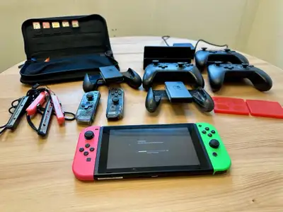 Nintendo Switch Bundle - 5 Games, 3 Controllers, Case, Dock, View more
