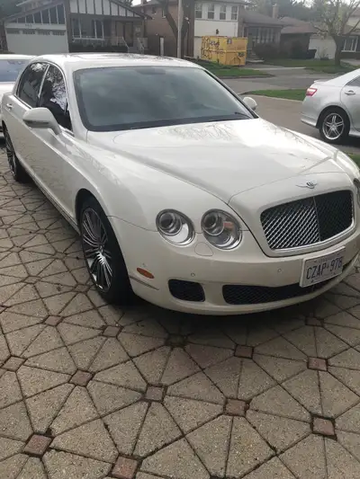 selling my gorgeous twenty ten Bentley flying spur speed edition in beautiful white with lipstick re...