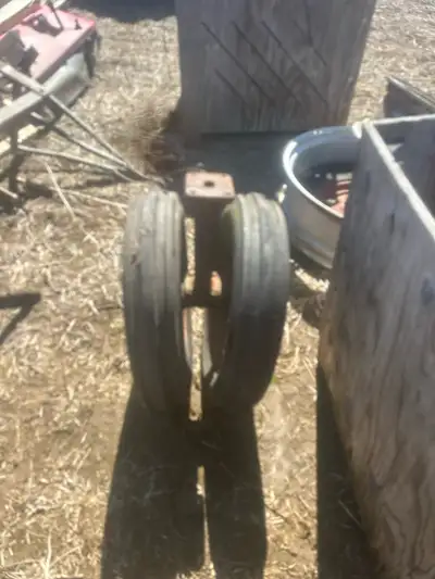 Almost new front tires with tricycle frame/hubs and rims from a farmall c