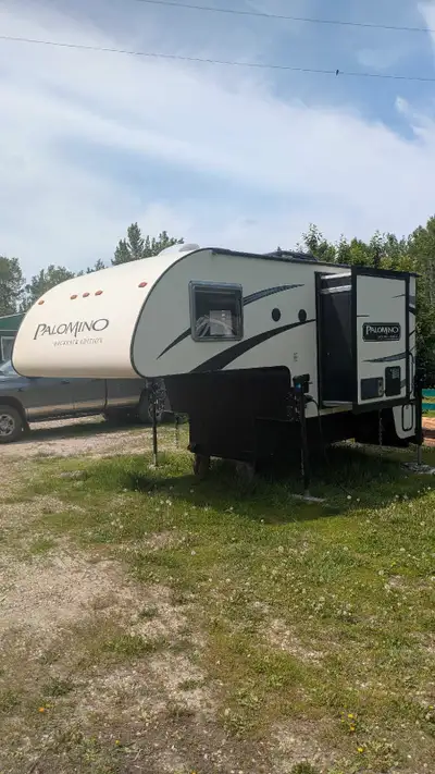 2014 Palomino Truck Camper 1 ton truck needed Slide out kitchen Slide out sitting area Toilet and sh...