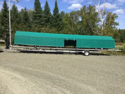 Aluminum floating garage 40’ long x 5’9” wide x5’7” high. Aluminum trailer 39’6” long x 8’4” wide Al...