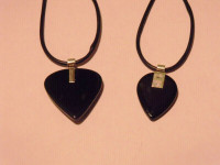 2 black polished stone, leather and sterling silver necklaces