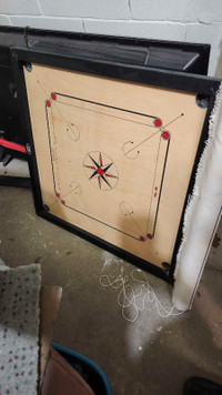 carrom board with coins