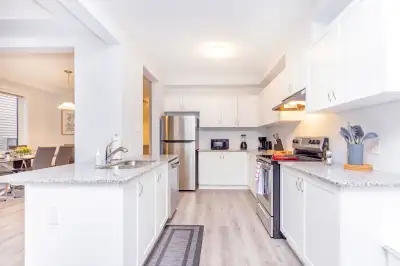 Central Kanata location a new modern spacious end unit townhome 1850 sqft of living space with open...