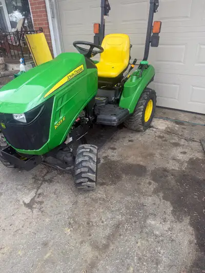 2017 John Deere 1023 e 3 cylinder diesel 359 hours New front industrial tires Three point hitch 54"...